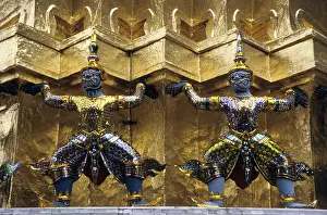 The statue of Demon (Yaksha), character from the Ramakien epic at golden chedi