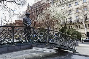 Statue of Imre Nagy on a bridge