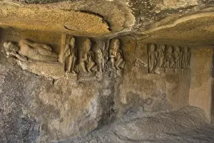 Statue of reclining buddha in pandulena caves