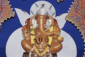 Statue of scarlet colour Lord Ganesha