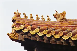 Statues on roof of pagoda, Beijing, China, Asia