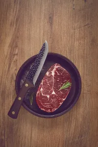 Steak made from fresh beef, with herbs and various spices