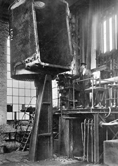 Steam locomotive construction, boiler being riveted with a hydraulic press