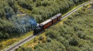 Steam railway, train with steam locomotive