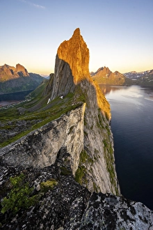 Steep mountain Segla, fjord Mefjorden with mountains