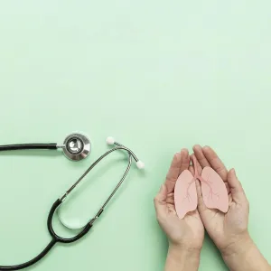 Stethoscope hands with miniature lungs