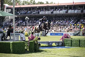 Category Historic EN Prints: Steve Guerdat of Switzerland and riding Venard de Cerisy compete in the first round of the 1