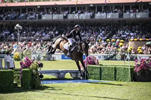 Category Historic EN Prints: Steve Guerdat of Switzerland and riding Venard de Cerisy compete in the first round of the 1