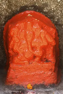 Stone carved statue of lord Ganesh made in scarlet colour at Shree Vishnu Narayan temple on top of Parvati hill