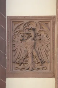 Stone eagle as state coat of arms and city coat of arms