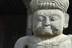 Stone statue of a Malla wrestler (closeup)