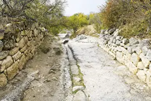 Stone street on the street of the medieval town of Chufut Kale in Crimea