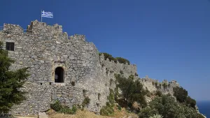 Stone-walled castle stretches across the landscape