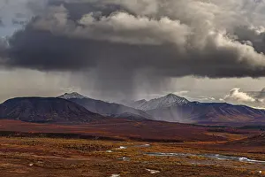 Stormy atmosphere and clouds over the autumnal Alaska Range