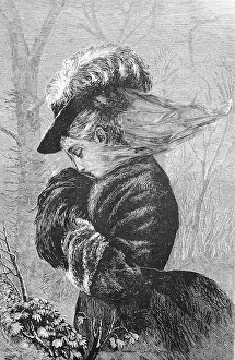 Stormy day in autumn, the veil of the elegant lady is blown away by the wind