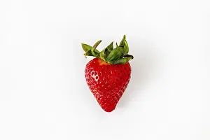 One strawberry on a white background, isolate