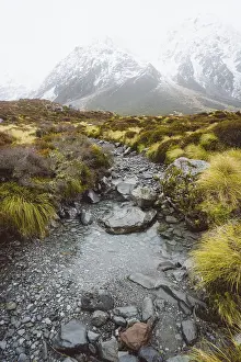 Stream flowing through a mountainous