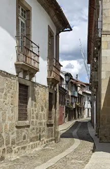 Street of historic buildings with balconies