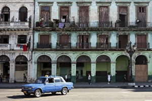 Street scenery, blue vintage taxi