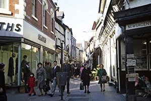 Strollers in the narrow medieval pedestrian street Drapers Lane in the city centre of York, Yorkshire, England, UK 1975