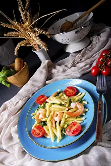 Strozzapreti pasta with spinach and prawns