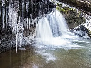 Struempfelbach brook with icicles in winter