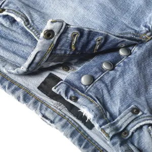 Studio shot of a pair of jeans detail in white back