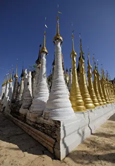 Stupas in front of a blue sky, Inle Lake