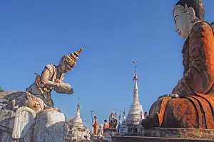Stupas and Buddha figures opposite Manuha Temple