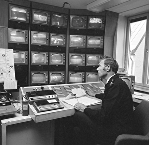 Subway safety in the 1970s. The feed from the subway surveillance cameras are monitored