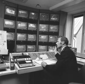 Subway safety in the 1970s. The feed from the subway surveillance cameras are monitored