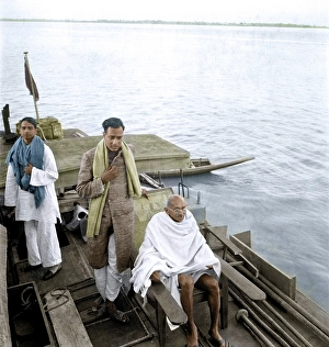 Sudhir Ghosh, Ramkrishna Bajaj, Mahatma Gandhi on boat to Midnapur, East Bengal, India, Asia, December 24, 1945, Asia