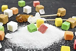Sugar of white, brown, pink, green