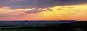 Summer landscape in the mountains at sunset with red sky