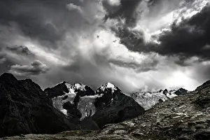 Summit of the Bernina Group with dramatic clouds