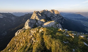 Summit of the Scheffauer, view of rocky ridge of the Kaisergebirge at sunset