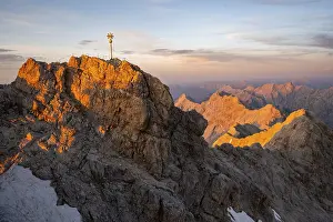 Summit of the Zugspitze with golden summit cross