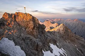 Summit of the Zugspitze with golden summit cross