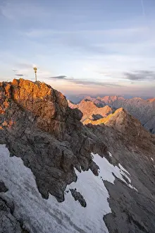 Summit of the Zugspitze with golden summit cross