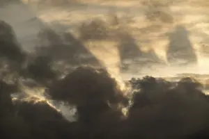 Sun breaks out from behind clouds
