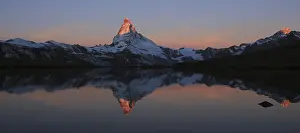 Sun lit peak of Mount Matterhorn
