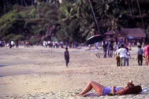 Sunbather at Kovalam beach near Thiruvananthapuram Trivandrum