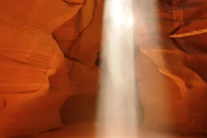 Sunbeam falling into the cave, red sandstone of the Moenkopi rock formation