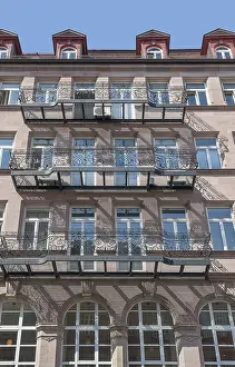 Sunny illuminated detail of a house facade seen in Nuremberg