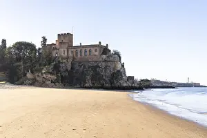 Sunrise on the Atlantic, a castle in the middle of the beach