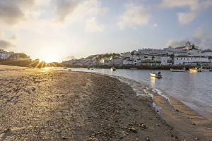 Category Historic EN Prints: Sunrise on the Atlantic, skyline of a fishing village behind a harbour
