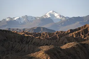 Sunrise over canyons, Tian Shan mountains in the background