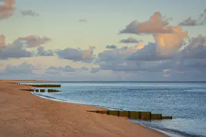 Sunrise on Ellenbogen beach, breakwater