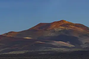 Sunrise in the Fire Mountains, volcanic landscape in Timanfaya National Park