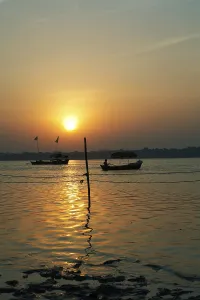 Sunrise at Ganges river at triveni sangam